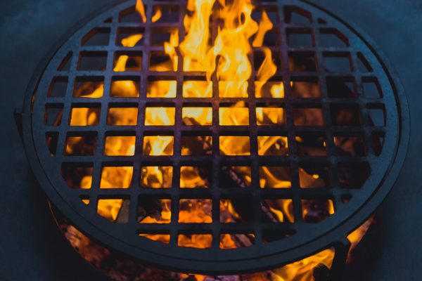 barbecue grill, close – up. professionally cooking food on an op barbecue grill, close - up. professionally cooking food on an open fire on a cast-iron grate.